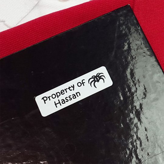 Stick-on label on school book